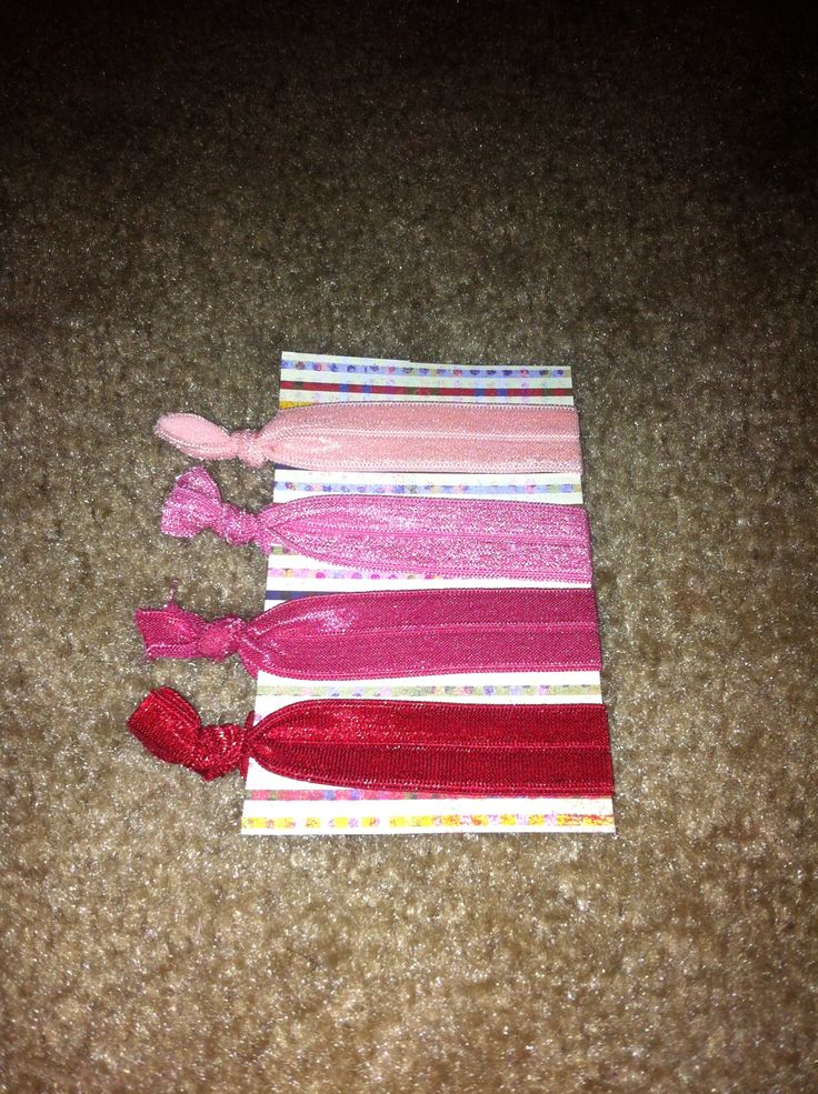 4 pieces of handmade elastic hairties. Www.etsy.com/shop/pearlsnstitches